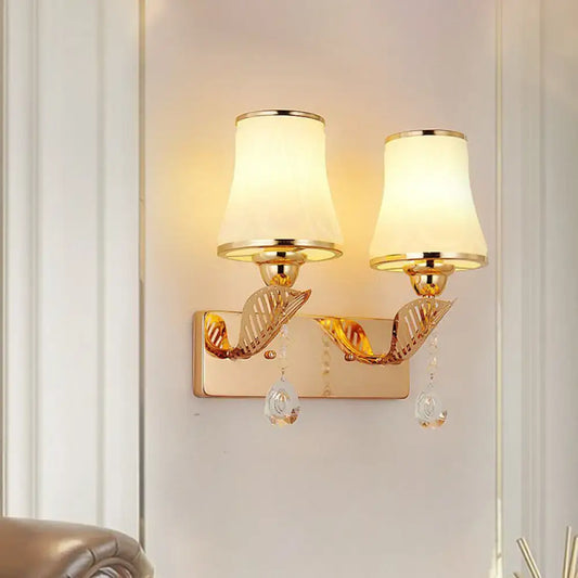Modernist gold finish wall light with leaf-shaped metal arms and crystal drops compatible with 220v-240v 110v-120v