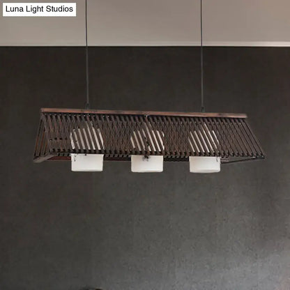 Decorbites modernist linear island lighting with dark metal frame, beige brown finish, and three white glass shades