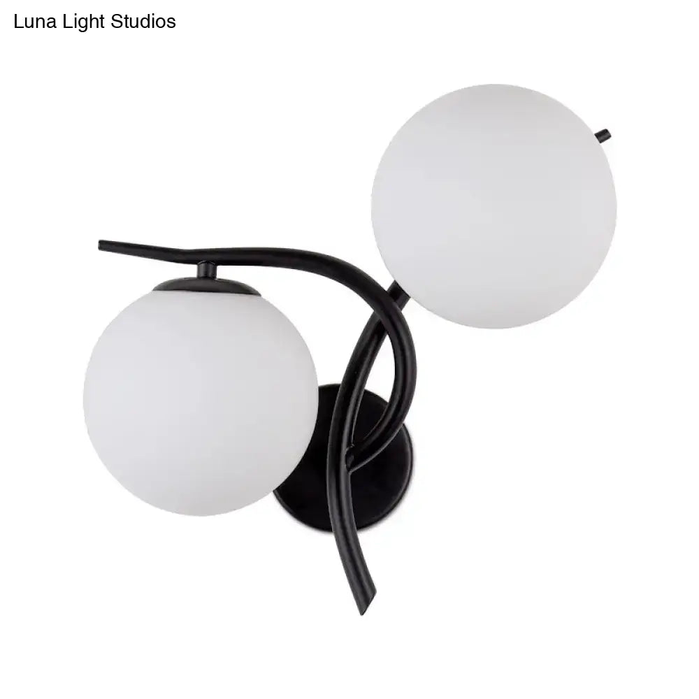 Black metal light fixture with silver black frame and milky glass shades for modernist bedroom lighting
