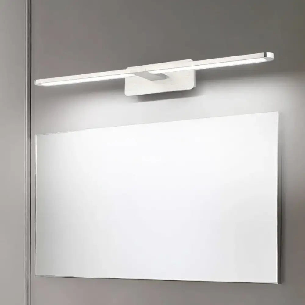 Modernist silver metal wall sconce lamp with sleek white led vanity light mounted above a mirror for living room use