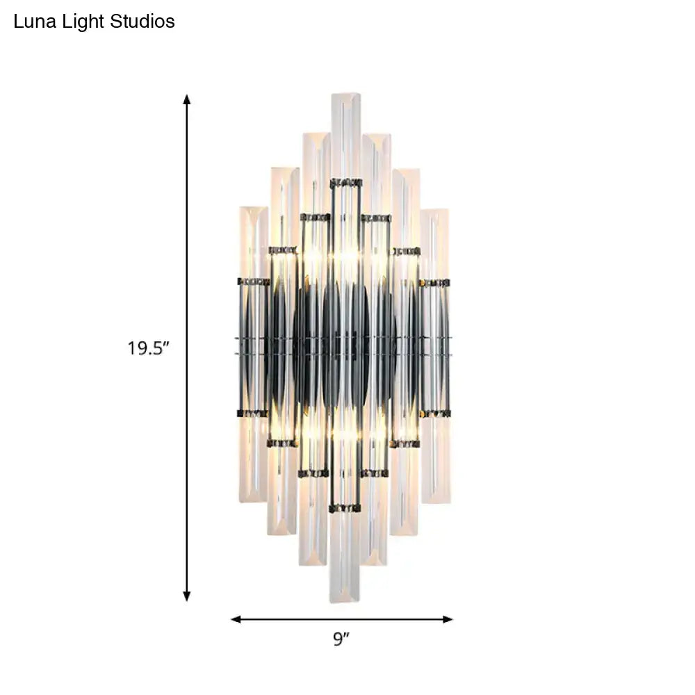 Modernist style wall light with black metal accents and clear acrylic tubes designed for 110v-120v living room use
