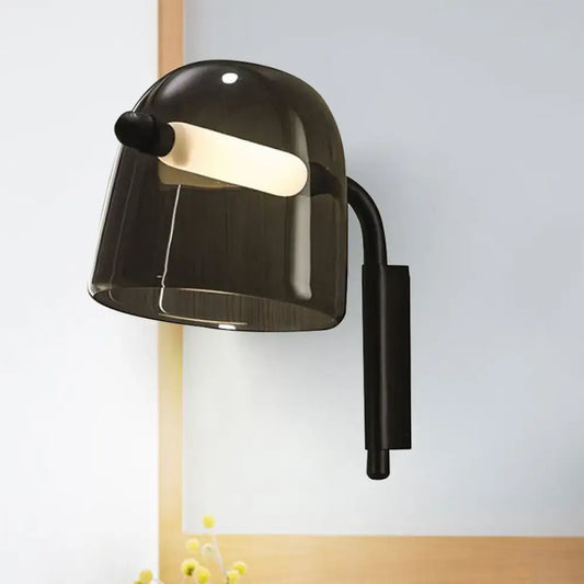 Modernist white black glass wall lamp with a curved arm and frosted accent designed as a living room wall sconce