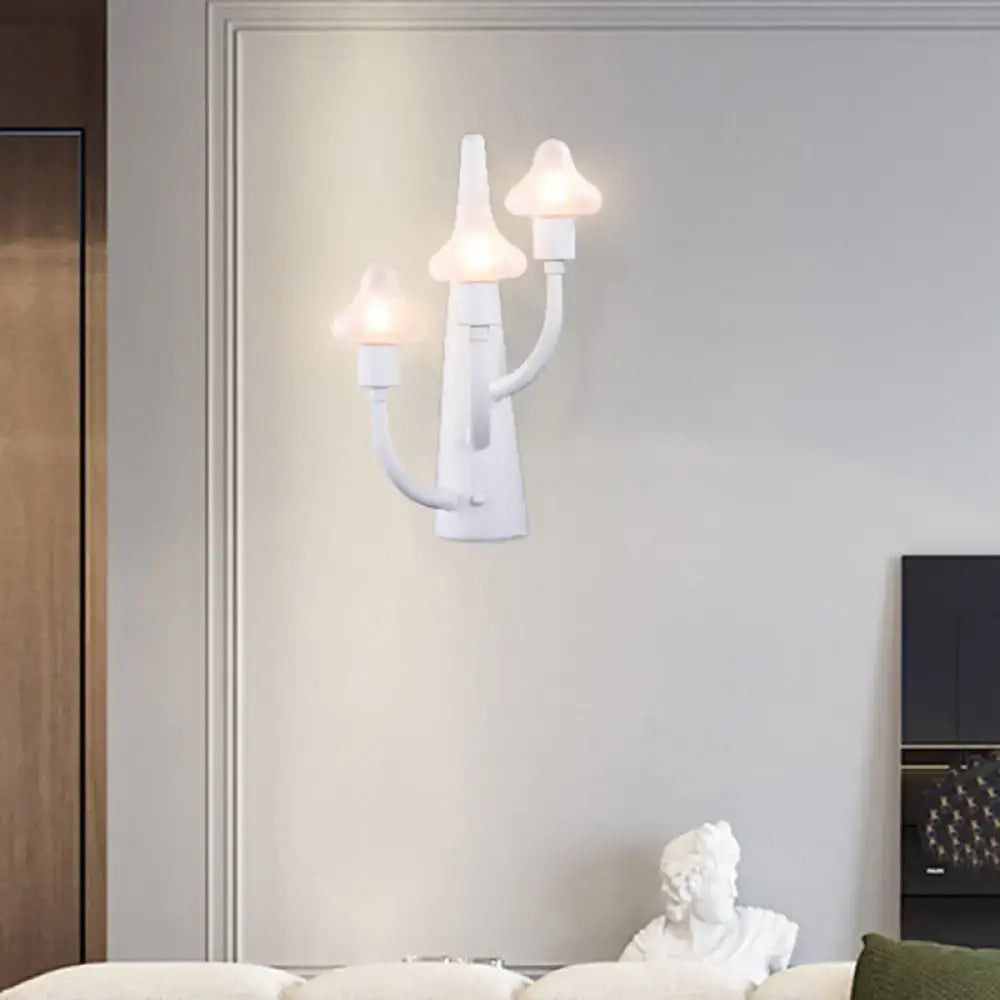 White three-arm modernist ceramic wall sconce with mushroom opal glass shades for living room lighting