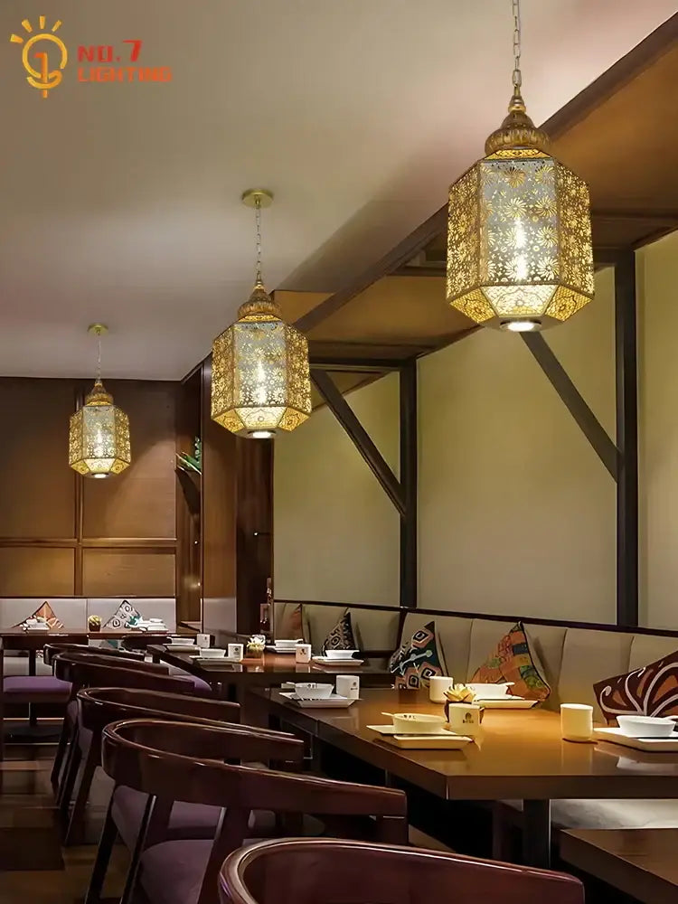 Golden intricately patterned moroccan gold lustre pendant lights with warm glow for dining room decorbites gold lustre
