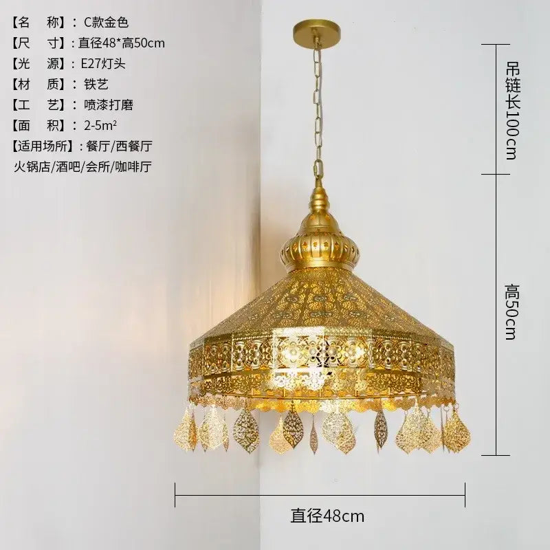 Moroccan gold lustre pendant lights featuring a golden ornate chandelier with intricate filigree and leaf tassels for decorbites gold lustre