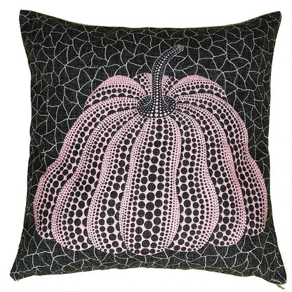 A square black decorbites cotton pumpkin pillowcase with a stylized pink dotted pumpkin on a cracked background