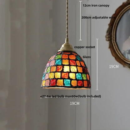 A vibrant dome-shaped decorbites conch glass led pendant light with colorful mosaic panels for dining room decor