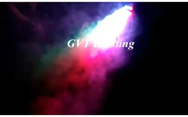 A vibrant multicolor beam from a mini stage smoke machine cutting through dark smoke for living room parties