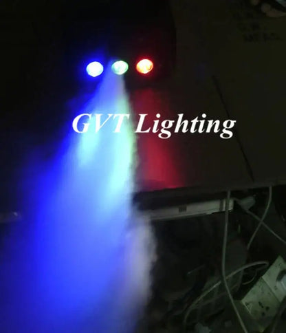 A trio of gvt black led mini stage lights emit vibrant blue green and red beams through haze with mini stage smoke