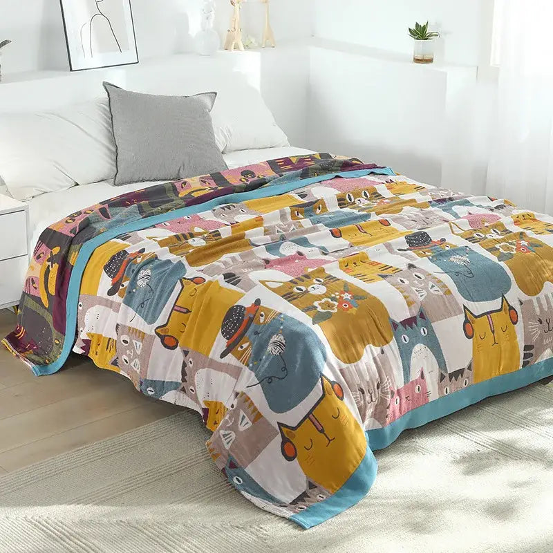 Multicolor boho printed cotton blanket featuring playful cartoon cats and a solid teal border for bedroom decorbites boho printed bed throw