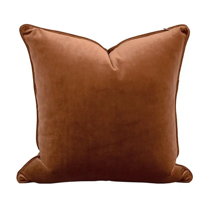 A plush caramel brown velvet cushion cover with neatly stitched edges from decorbites geometric embroidery abstract collection
