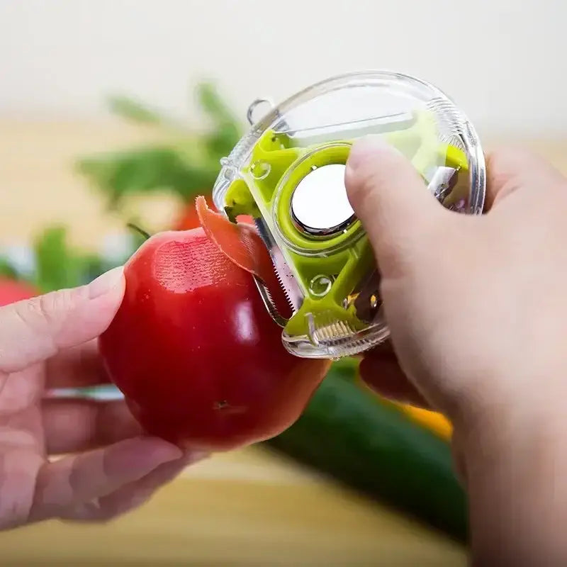 Green and clear plastic circular vegetable peeler from magic peeler trio set for kitchen slicing and shredding tasks