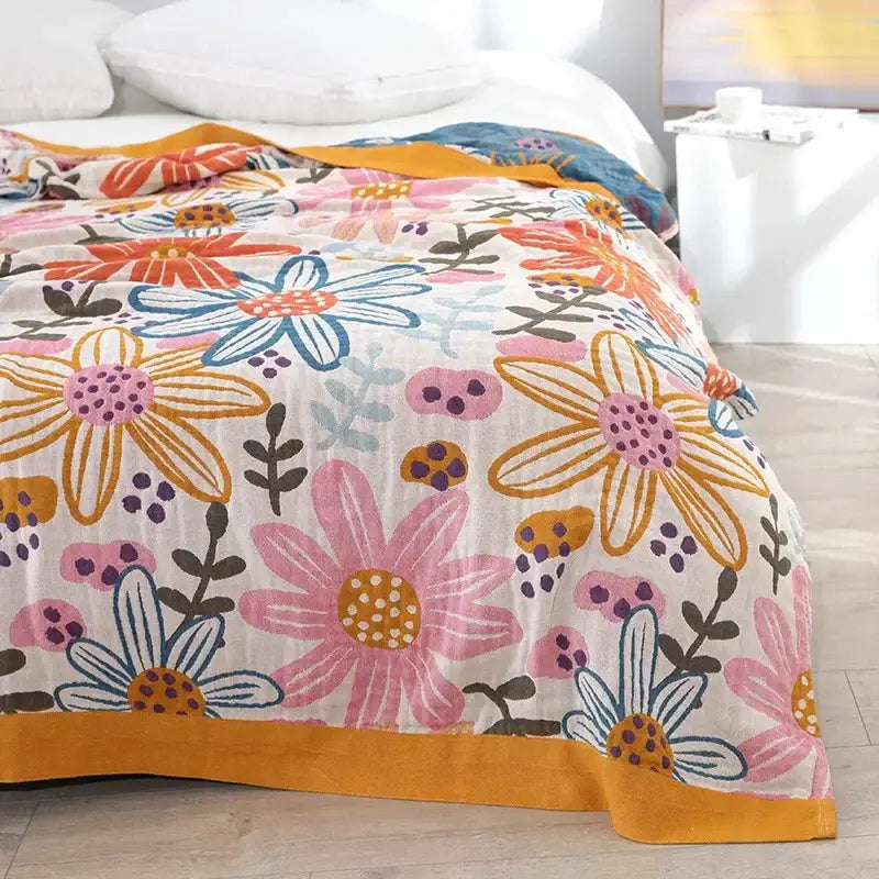 Multicolored cotton gauze boho throw blanket with vibrant floral pattern on cream background for bedroom or living room decorbites cotton gauze