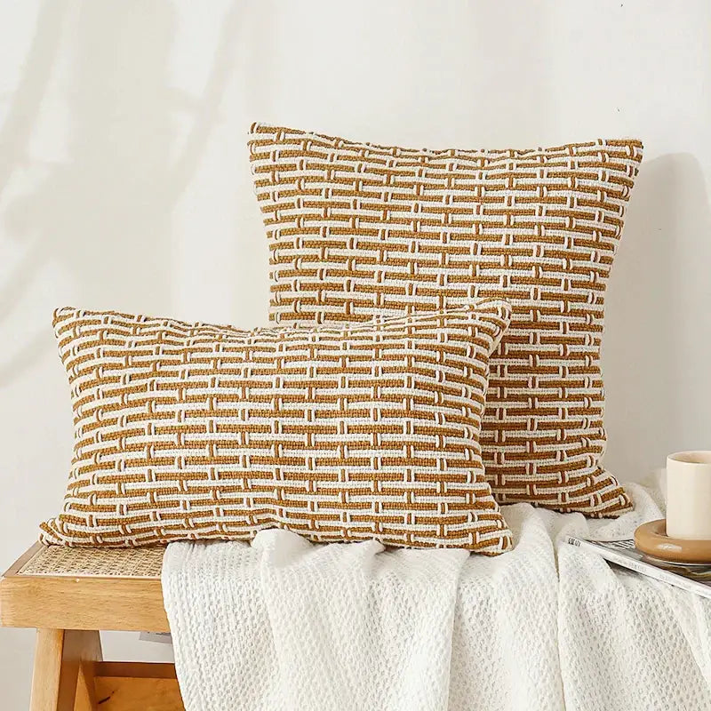 Two woven cotton woven texture cushion covers in mustard and cream with basketweave pattern for living room decorbites