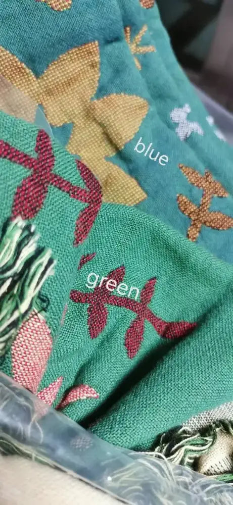 Teal cotton throw blanket with woven pattern and embroidered red gold and white flowers for decorbites gauze flowers decor