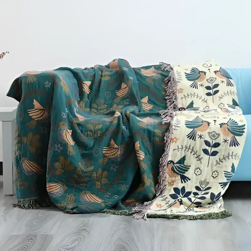 Teal and cream cotton throw blanket with embroidered birds and gauze flowers pattern and fringed edges for decorbites decorbites gauze flowers