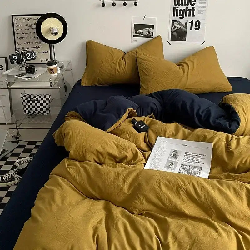 Crumpled mustard textured cotton bedding set with navy blue decorbites cotton bedding and matching pillows