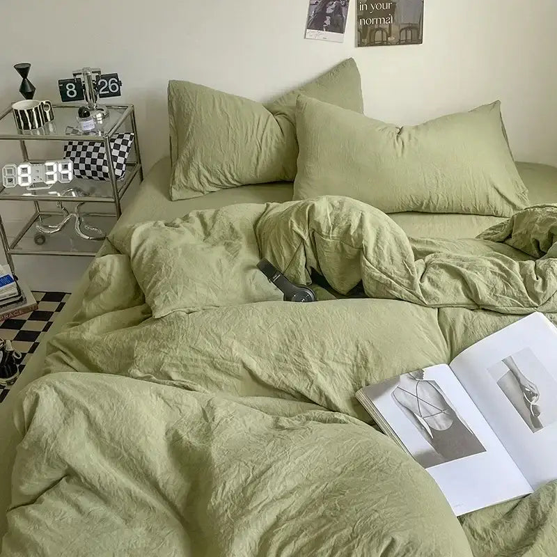 Olive green linen bedding set with soft textured fabric and matching pillows complementing decorbites cotton bedding set