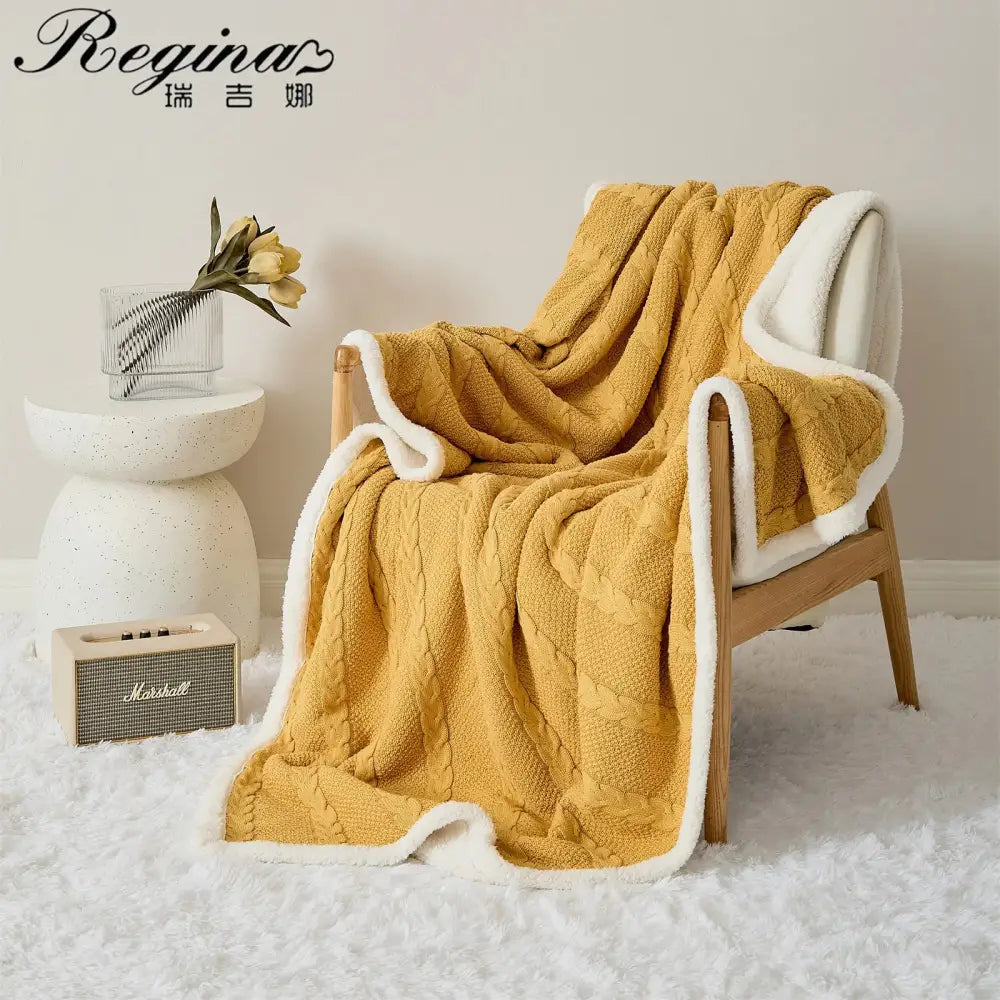 Warm mustard yellow cable knit sherpa blanket with plush white fleece lining for cozy bedroom decorbites throw