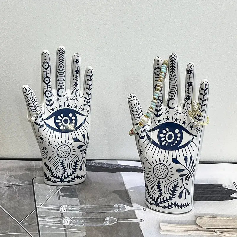 Mystic white ceramic hand jewelry holder stand with intricate black celestial line art for bedroom decor