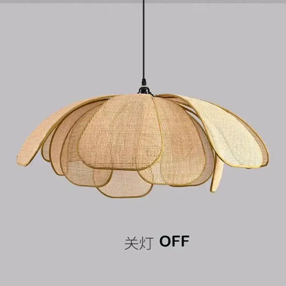 Beige woven natural rattan pendant light with layered petal design serving as a dining room light source