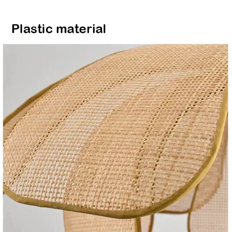 Beige woven plastic chair with gold-trimmed edges complementing natural rattan woven pendant light for dining room