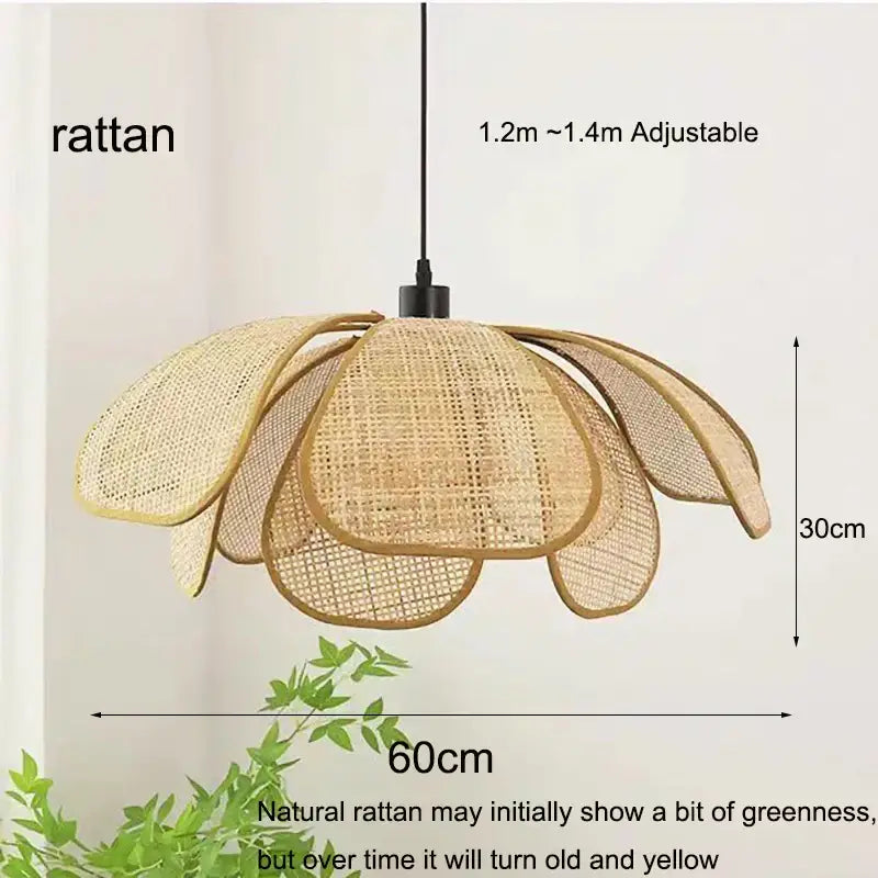Beige flower-shaped pendant light made of natural rattan with black hanging cord as a dining room light source