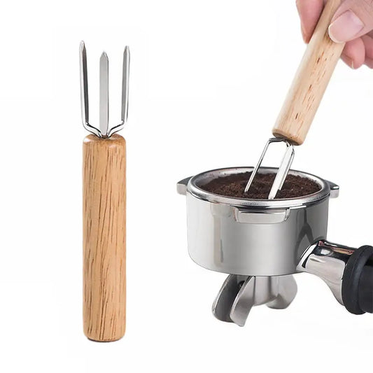 Wooden-handled decorbites espresso stirrer with a natural wood three-pronged metal head for barista use
