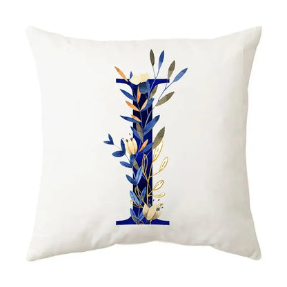 White throw pillow with stylized i featuring blue alphabet flower decorbites design for bedroom decor