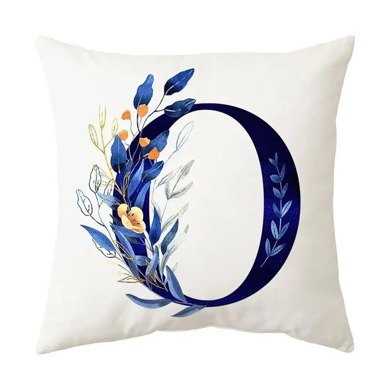 White throw pillow with navy blue alphabet flower letter o featuring decorbites blue alphabet foliage for bedroom decor