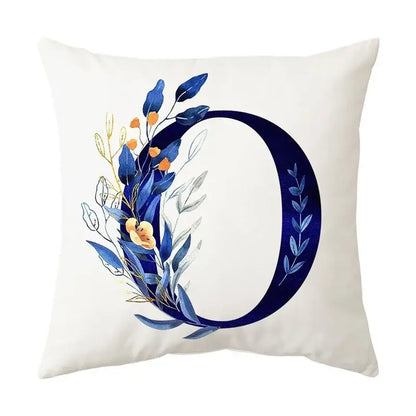 White throw pillow with navy blue alphabet flower letter o featuring decorbites blue alphabet foliage for bedroom decor
