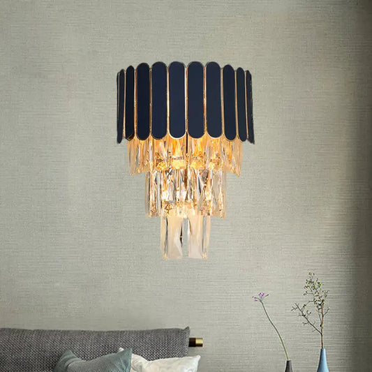 Elegant navy blue and gold rectangle-cut crystal wall sconce with cascading droplets for living room lighting idea