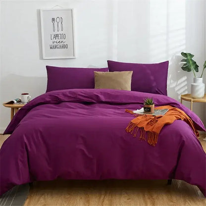 Purple satin-like bedding set with soft folds and tan accent pillow in navy blue solid color decorbites cotton 4pcs