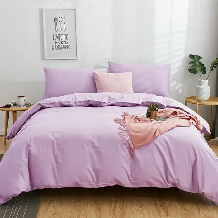 Lavender-colored bedspread with soft smooth texture and subtle sheen in navy blue solid color decorbites cotton 4pcs bedding set