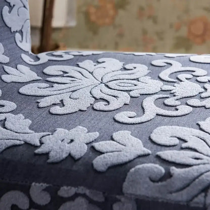 Gray upholstered chair with raised silver floral embossed print featuring decorbites 3d embossed chair covers for dining room