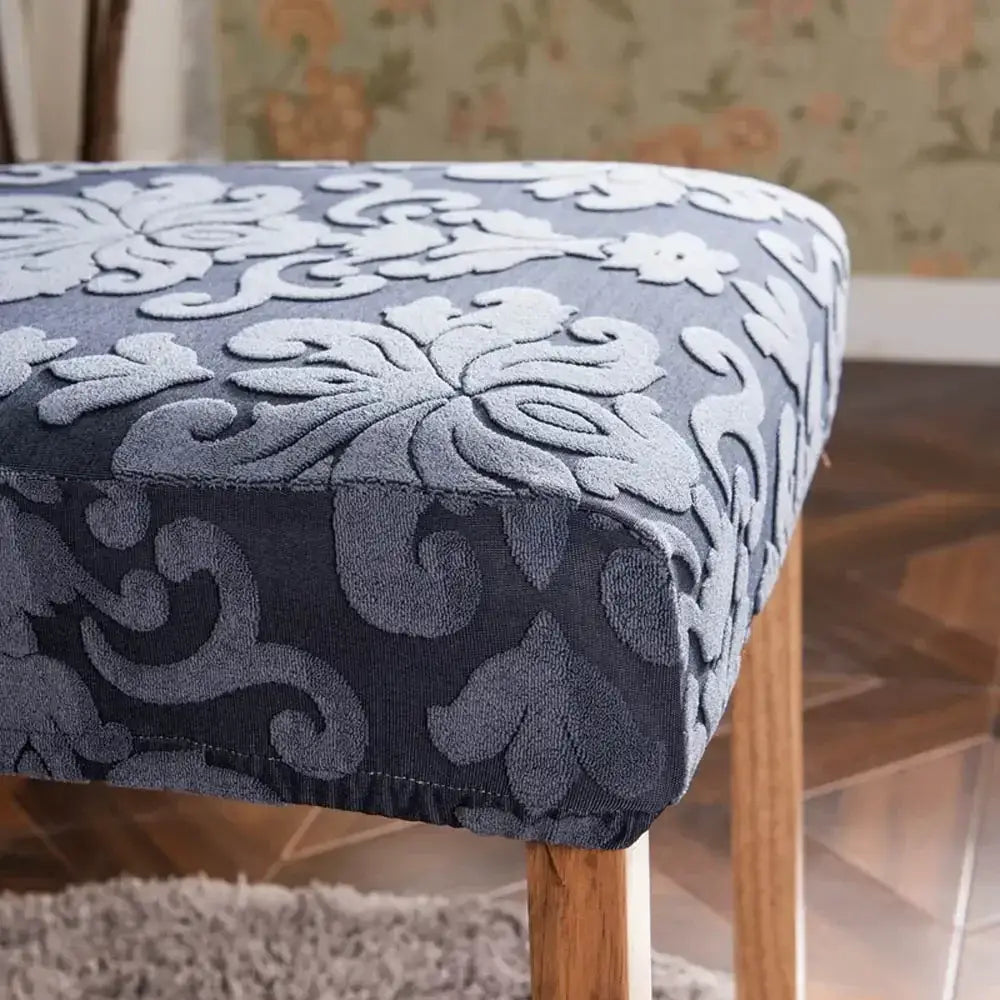 Dark gray upholstered chair cover with navy and light gray embossed print featuring decorbites 3d embossed embroidery