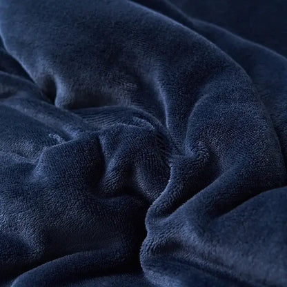 Deep navy blue double layer queen blanket with soft textured fleece surface in plush sherpa comfort design