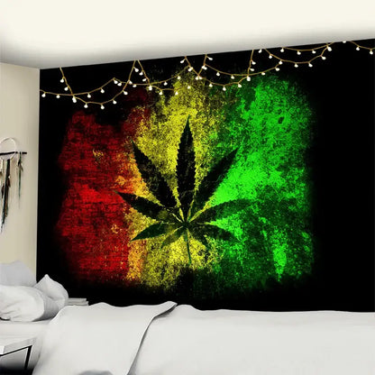 Rasta-themed wall tapestry with a black cannabis leaf silhouette on a red yellow and green background featuring printed maple leaf decor