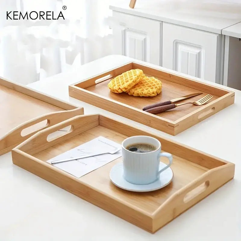 Light brown rectangular wooden trays made of bamboo with integrated handles for kitchen storage organization