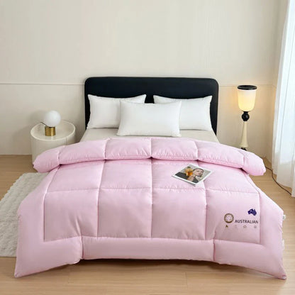 Pink quilted new zealand wool quilt with plush texture and subtle stitching for four season household bedding
