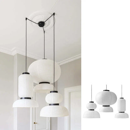 Noguchi pendant light with white rice paper lantern light and black metal accents for dining room or shop hanging light