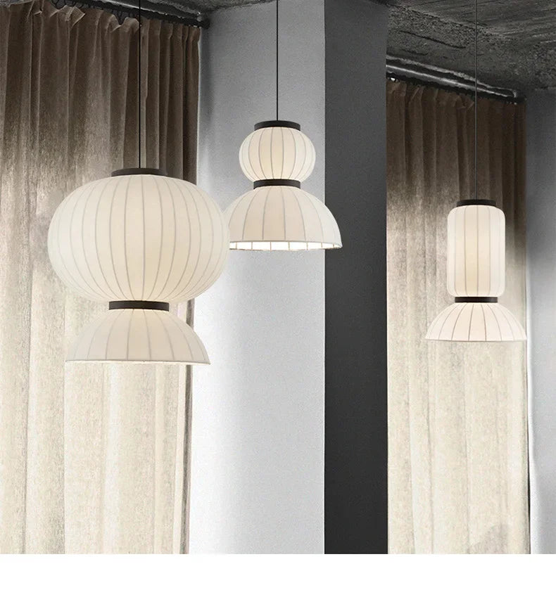 White ribbed paper lantern light pendant with black metal accents for dining room and shop hanging light decor