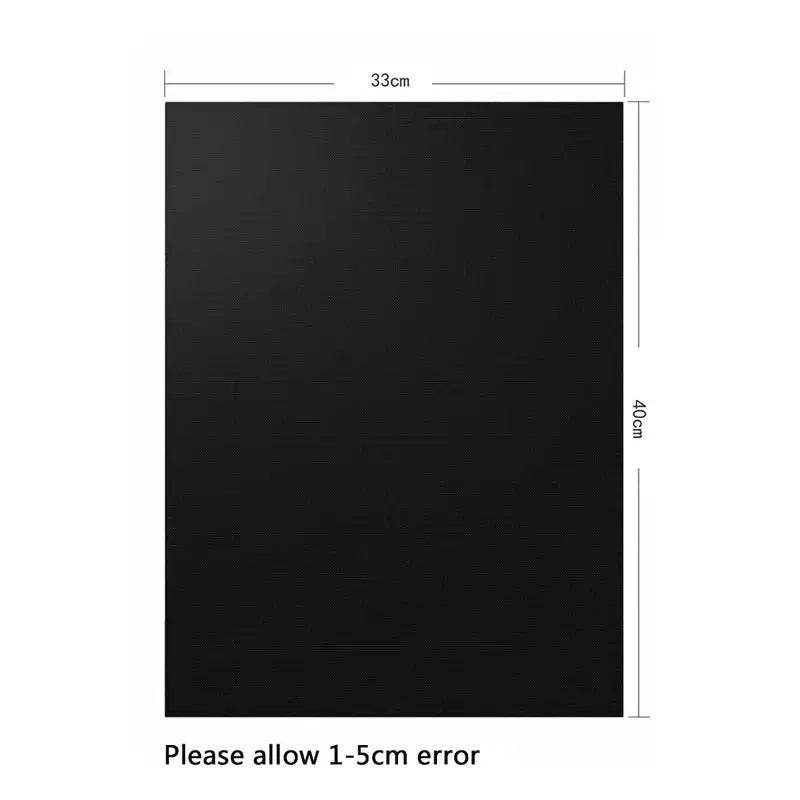 Non-stick black bbq grill mat 33cm wide and 40cm tall for kitchen and outdoor cooking use