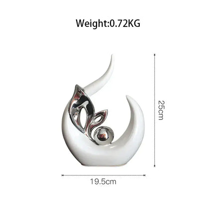 White ceramic figurine with silver accents and reflective sphere nordic ceramic figurine for living room decor