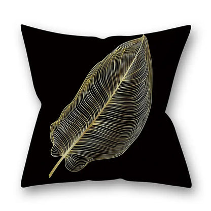 Black throw pillow featuring delicate gold leaf design with fine line art for nordic golden leaves pillow decor
