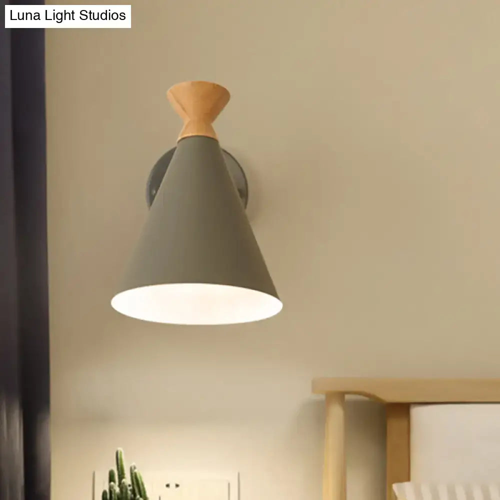 Gray conical wall light with wooden top metal cone shade and metal mounting bracket for bedroom reading lamp