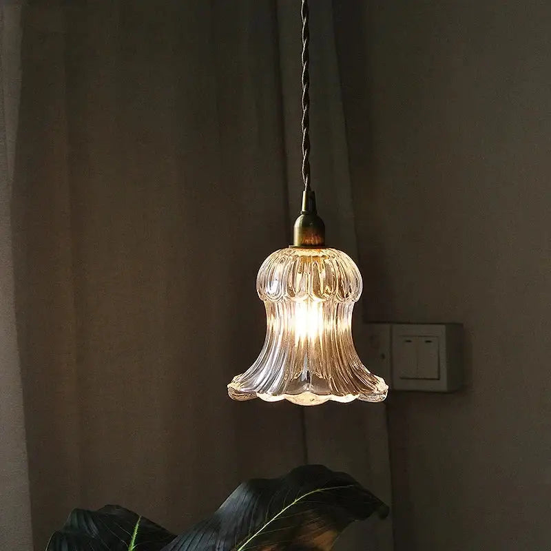 Nordic brass and ribbed glass pendant light fixture with clear glass and twisted black cord for kitchen lighting
