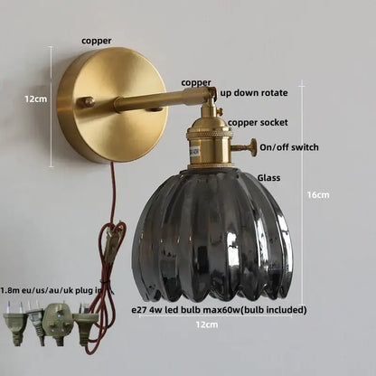 Brass-finished wall lights with clear ribbed glass shade and copper socket for bedroom decorbites clear glass style