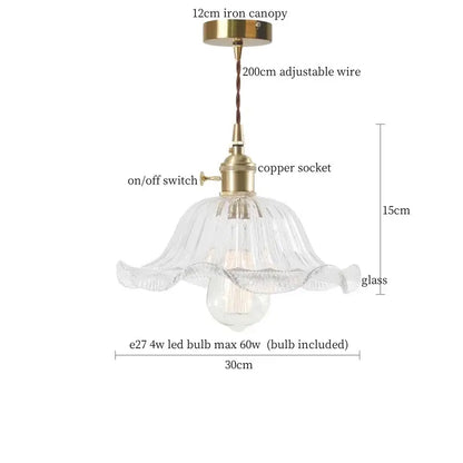 Nordic brass glass flounce led pendant light features a clear fluted glass shade with brass finish for dining room use