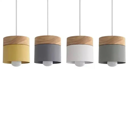 Four minimalist pendant lights with natural wood tops and colorful wood iron bodies for living room decorbites decor